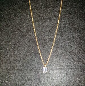 Elegant Gold Necklace with Clear Pendant